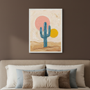 Bedroom with a beige bed and headboard. Above the bed hangs a framed textured painting of a blue saguaro cactus in a desert, with a large pink sun and a smaller yellow sun against a light background.