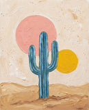 Stylized oil painting of a blue-toned saguaro cactus centered between large textured pink and yellow suns on a warm desert background, creating a playful modern desert aesthetic.
