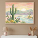 Modern living room with a white dresser. A large framed painting of a pastel desert landscape hangs above the dresser, featuring saguaro and prickly pear cacti, a river, and mountains under a setting sun in a painterly style.