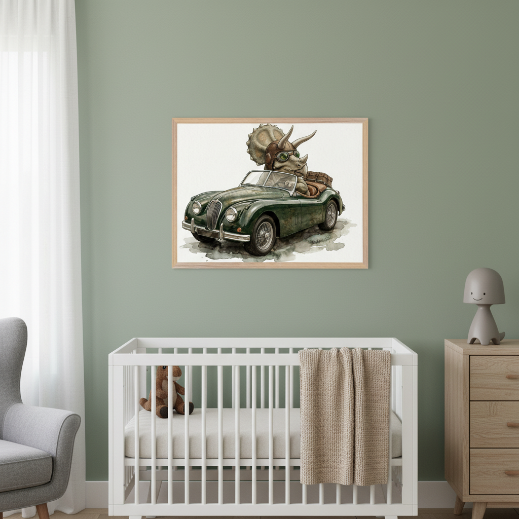 Modern nursery with a sage green wall. A white crib, gray armchair, and wooden dresser are visible. A framed watercolor painting of a triceratops in pilot goggles driving a green vintage convertible car hangs centered above the crib.
