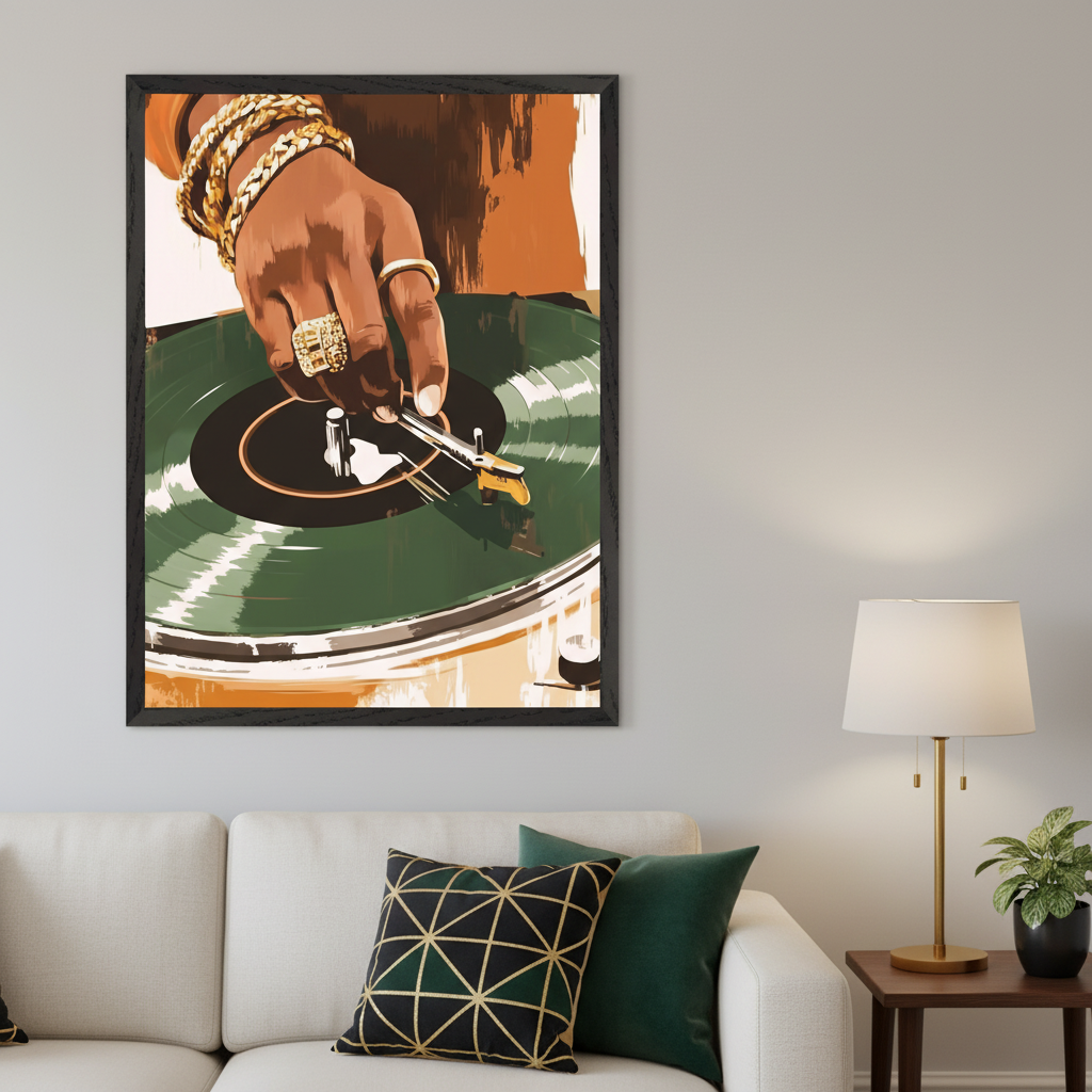 Living room with a white sofa and patterned pillows. A large framed illustration of a hand with gold jewelry operating a green vinyl record on a DJ turntable hangs above the sofa. A wooden side table with a brass lamp and a potted plant sits to the right.