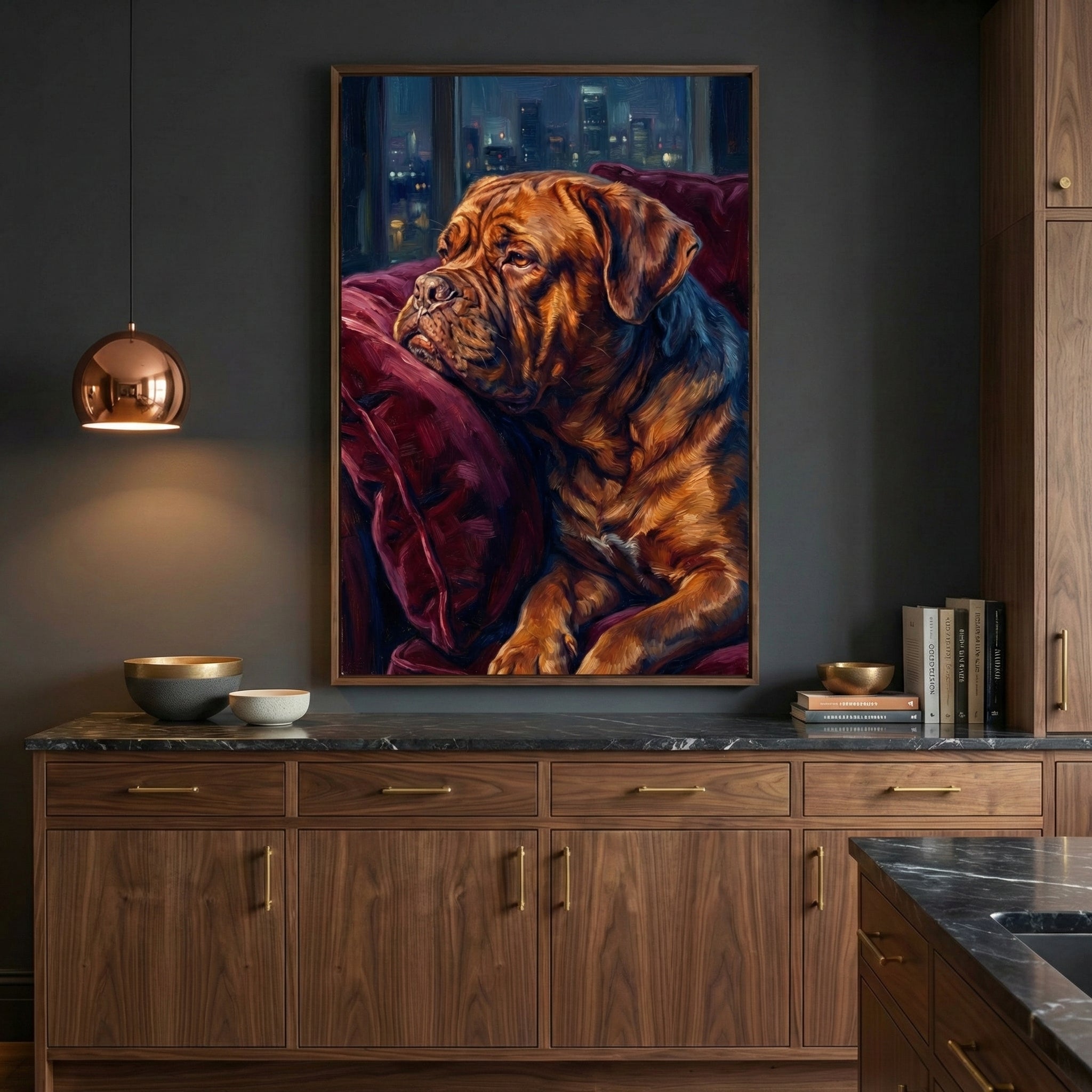 An image of a brown mastiff resting its head on a deep red velvet cushion while gazing out a window at a city skyline at night, displayed in a wooden frame above a dark wood kitchen sideboard.