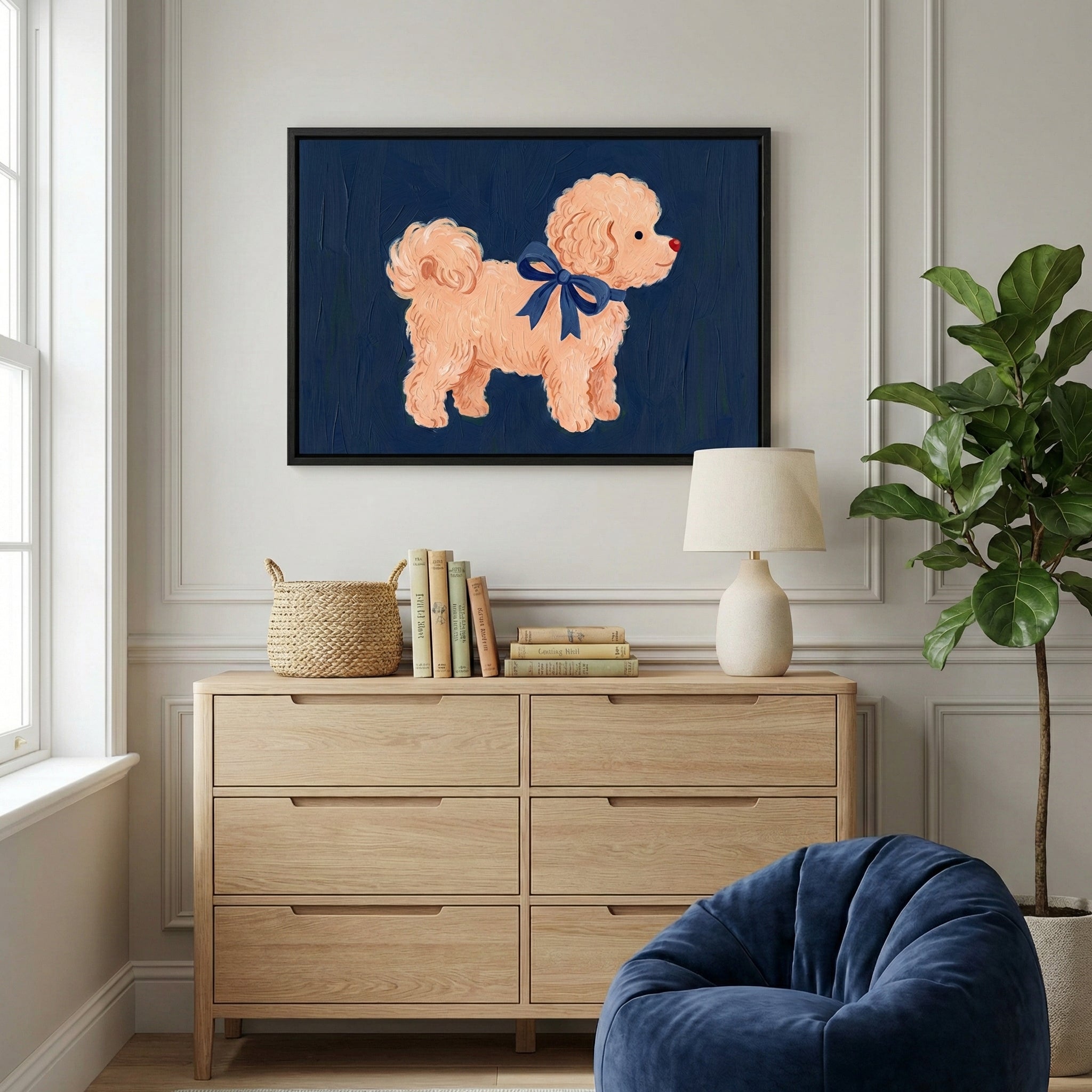 A framed painting of a soft, curly-haired dog with a navy ribbon and red nose adds playful warmth to an elegant nursery or family room. The deep blue backdrop contrasts nicely with the light wood furniture and natural accents.