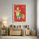 A framed illustration of a Corgi wearing a large cowboy hat and a patterned vest hangs above a wooden toy chest lined with stuffed animals. The room is decorated in a warm, neutral style with a small wooden side table, a reading lamp, and a woven basket.