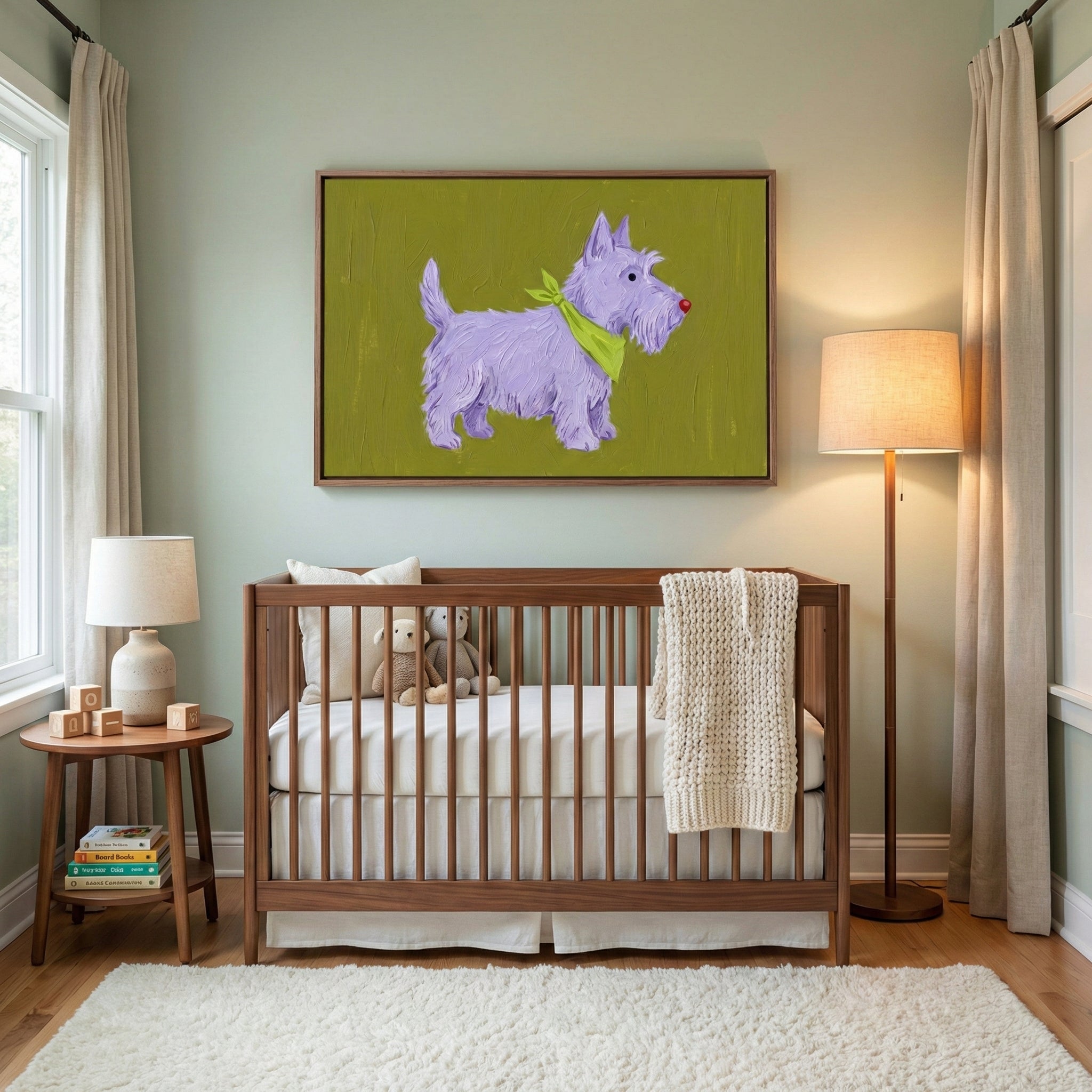 A framed artwork of a whimsical lavender terrier with a green scarf adds a sweet, imaginative touch to a cozy, softly lit nursery. The vibrant colors pop against the room's calm sage walls and wooden crib.