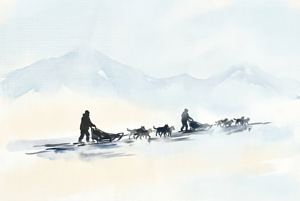 Soft watercolor scene of two people mushing sled dogs through a pale, foggy expanse with faint mountain outlines in the distance.
