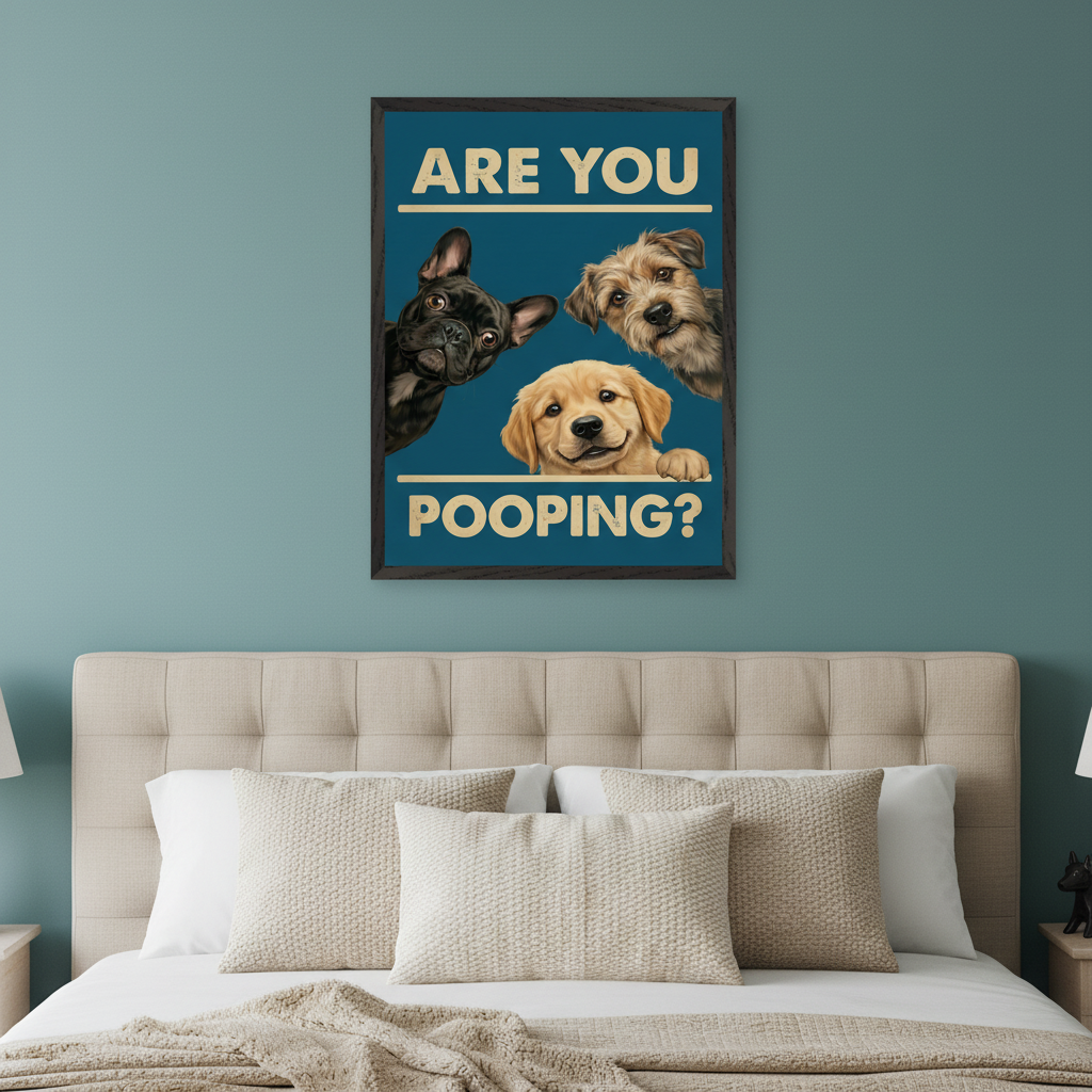 Bedroom with a beige tufted bed. A framed poster with three cartoon dogs (French Bulldog, terrier, golden retriever puppy) and the text "ARE YOU POOPING?" hangs centered above the bed.