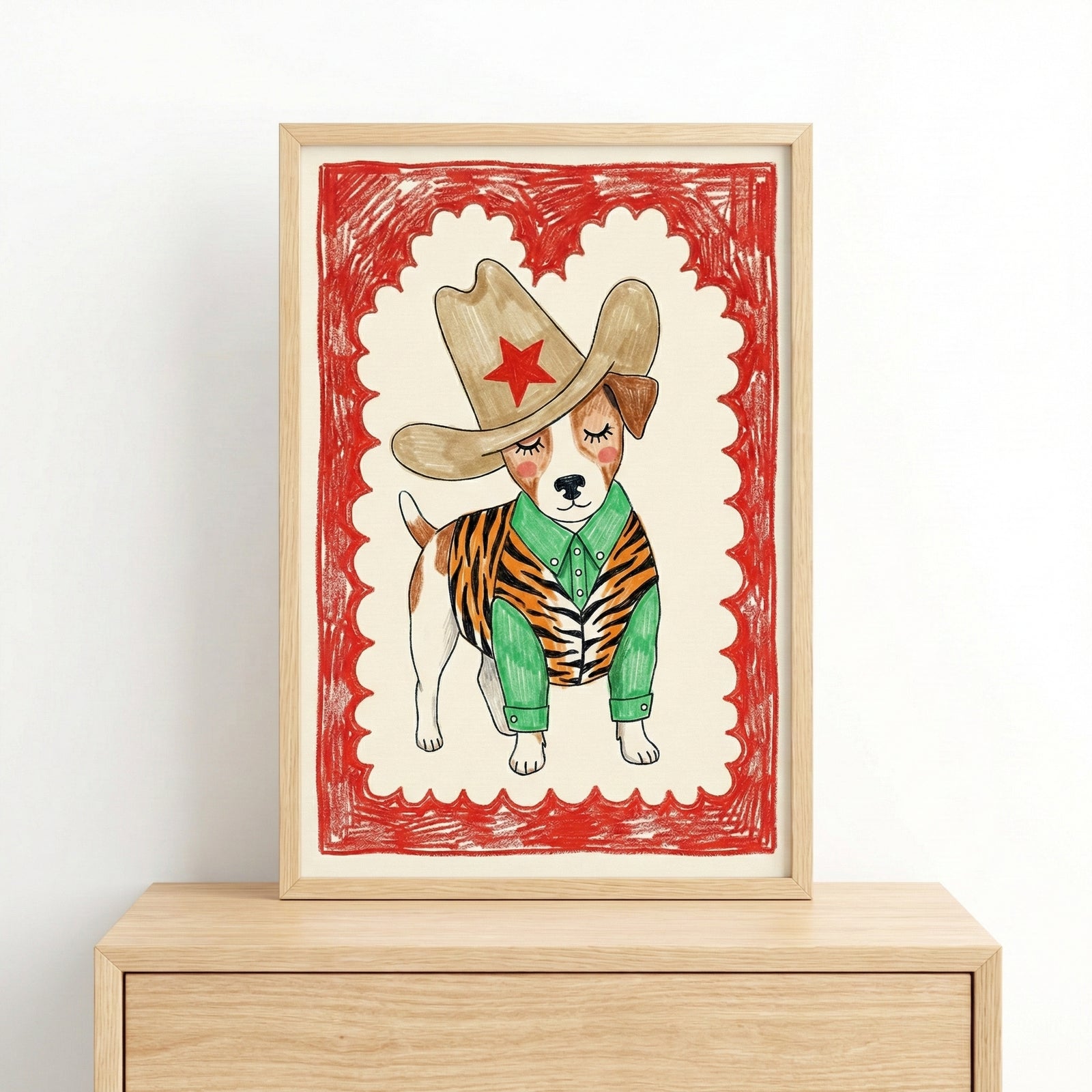 A framed illustration of a dog wearing a large cowboy hat with a red star, a green shirt, and a tiger-striped vest, set against a cream background with a red scalloped border. The playful western-themed art gives the dog a charming cowboy persona.