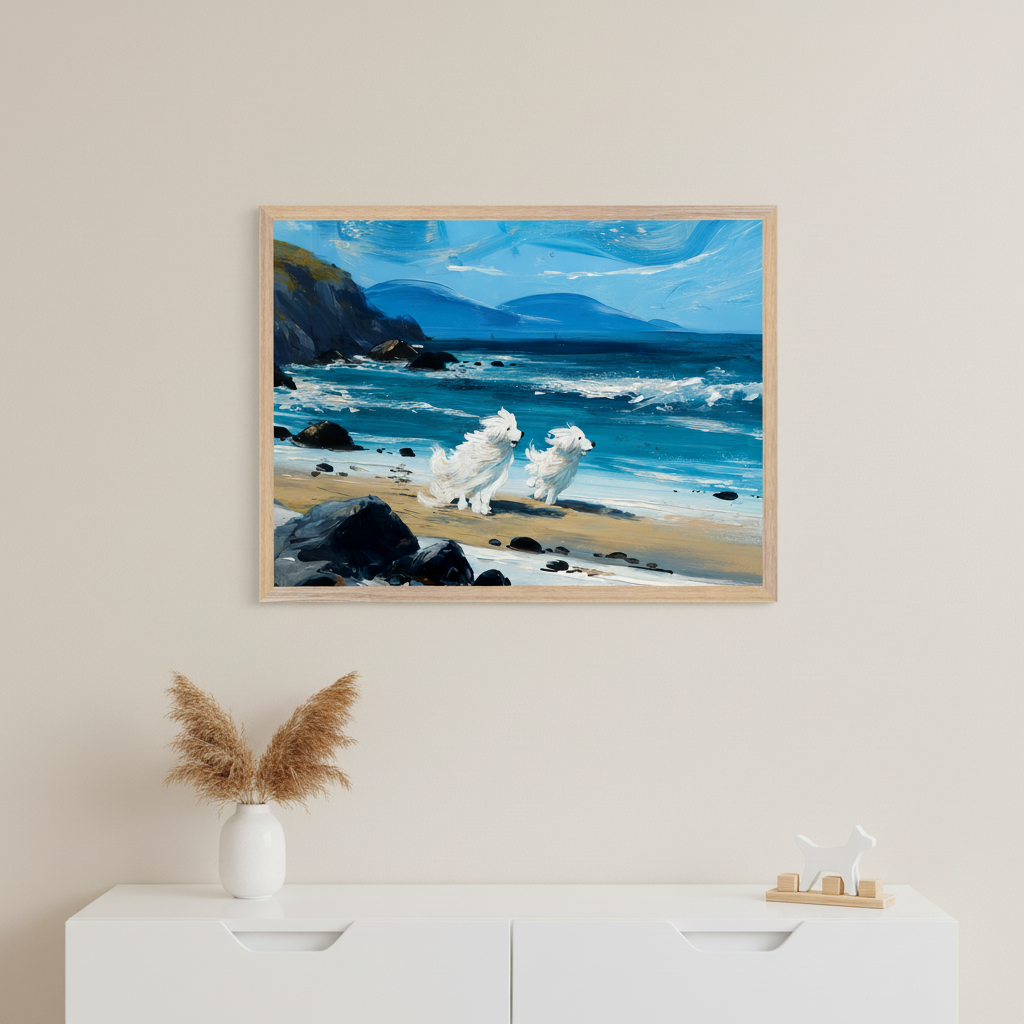 A framed illustration of two white fluffy dogs running on a beach by a blue ocean and rocky coast hangs above the dresser.