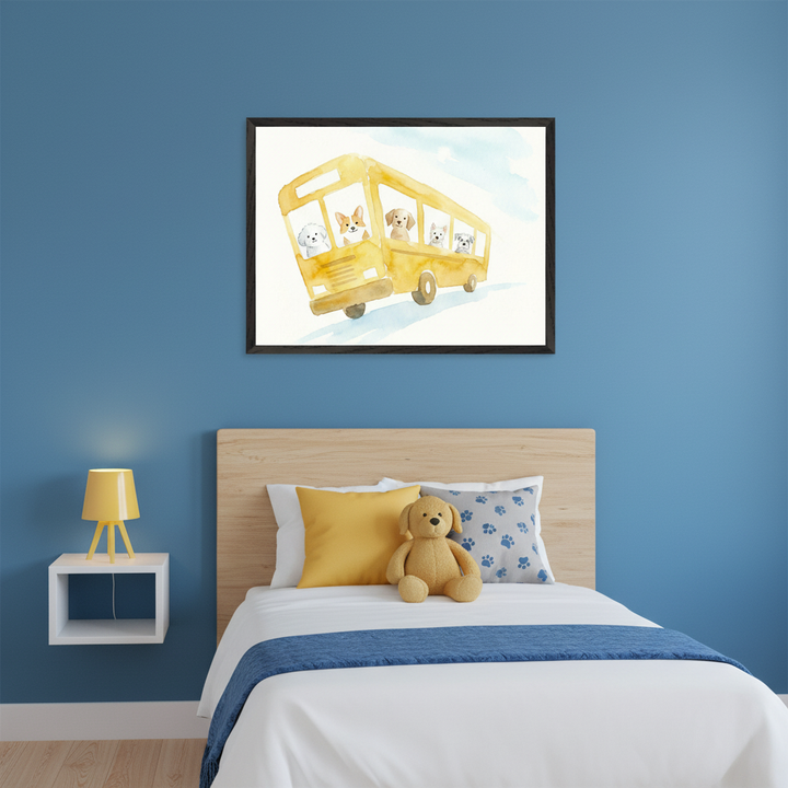 Kid's bedroom with a wooden headboard bed against blue walls. A black-framed watercolor painting of a yellow school bus with dogs looking out the windows hangs centered above the bed. A white floating nightstand with a yellow lamp is to the left of the bed.