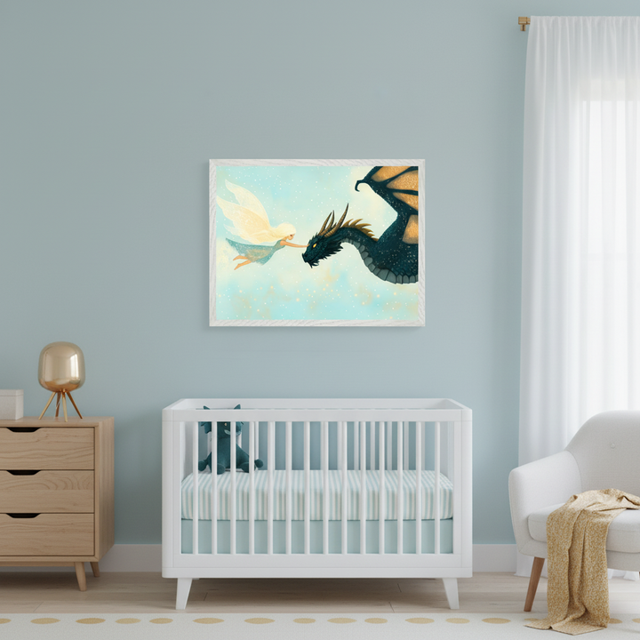 Modern nursery with a white crib, wood dresser, and white armchair. A large framed illustration of a blonde fairy touching a black dragon's nose hangs above the crib.