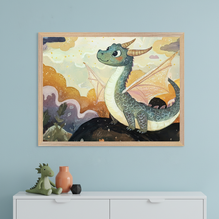 Modern child's room with a light blue wall. A large framed illustration of a friendly green dragon on a dark landscape with a colorful sky hangs above a white dresser. A plush dragon, orange vase, and black object are on the dresser.