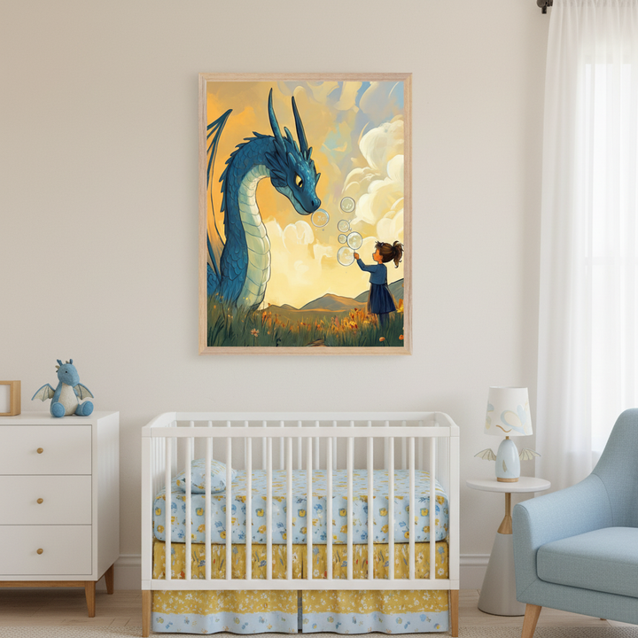 Modern nursery with a white dresser, white crib, and blue armchair. A large, light wood-framed illustration of a blue dragon watching a girl blow bubbles in a sunny field hangs above the crib and dresser.
