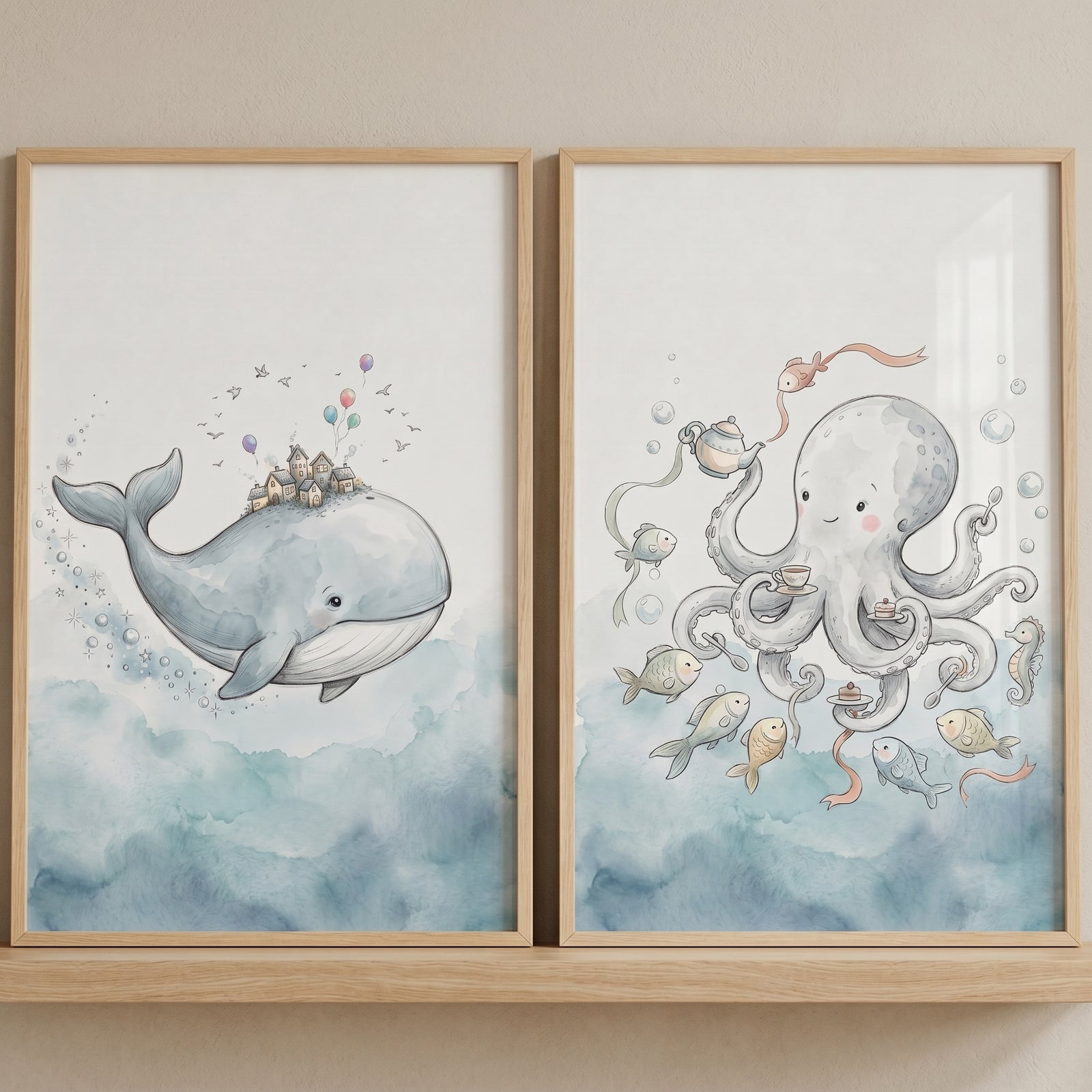 Dreamy blue ocean animal wall art set of 2 with a whale carrying houses and an octopus hosting a tea party.
