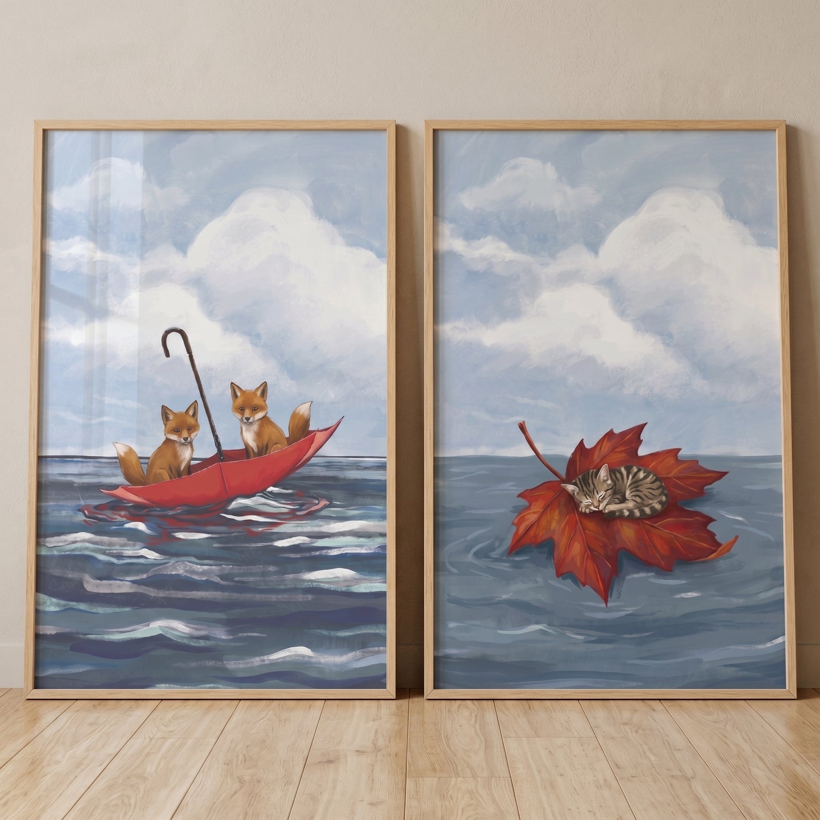 Foxes in a red umbrella and a kitten on a leaf in this dreamy blue ocean animals wall art set of 2.