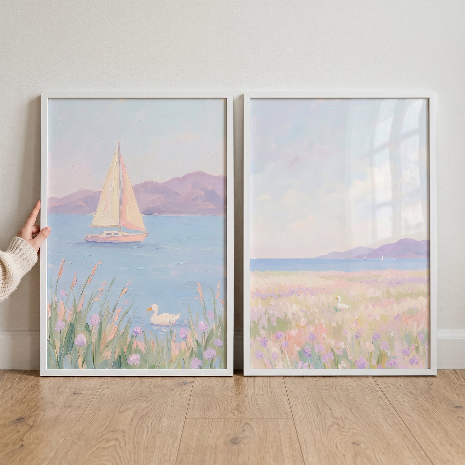 Dreamy lavender white duck wall art set of 2 showing a sailboat, small ducks, and purple flowers in soft pastel colors.