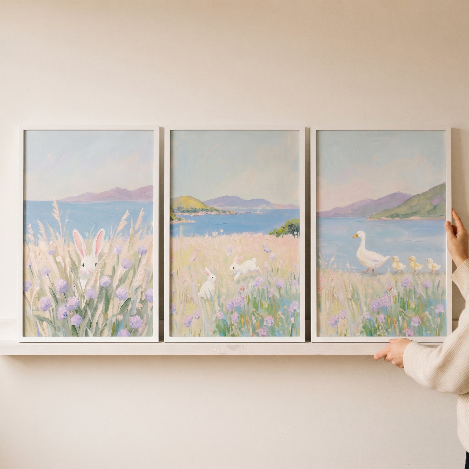 Dreamy lilac white animal wall art set of 3 featuring rabbits and ducks in a floral meadow by a scenic lake.