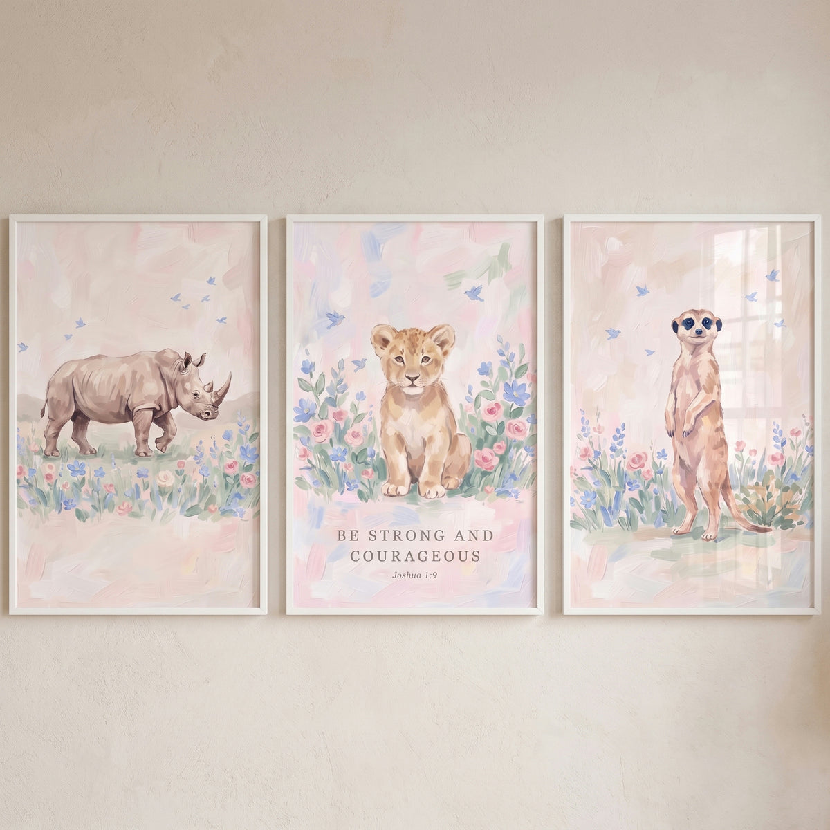 Dreamy painterly safari animals wall art set of 3 with a rhino, lion cub, meerkat, flowers, and Joshua 1:9 verse.
