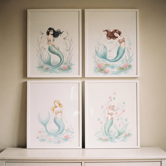 Dreamy pastel watercolor mermaid wall art set of 4 displayed in white frames on a neutral wall above a dresser.