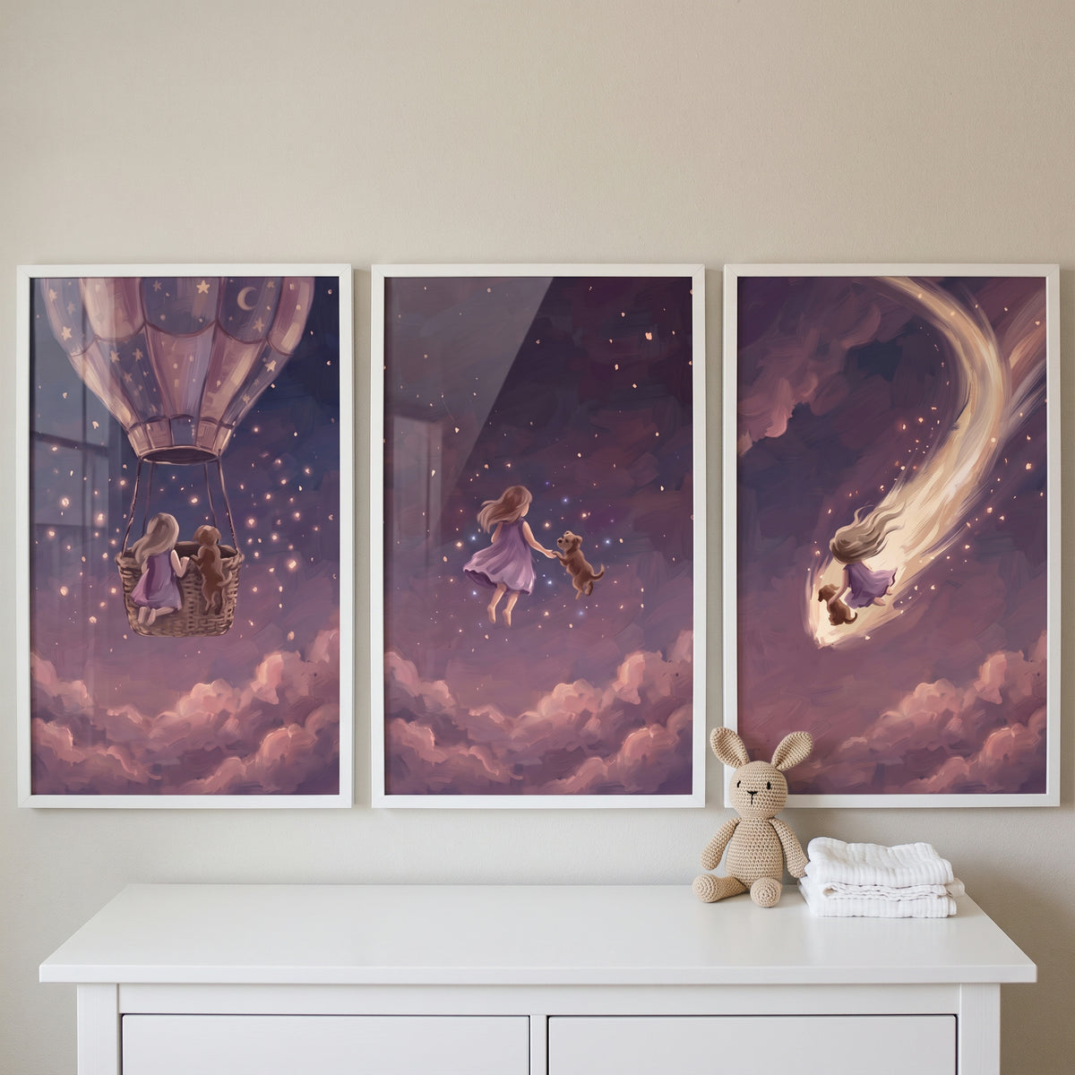 Dreamy periwinkle girl dog wall art set of 3 featuring a hot air balloon and comet above a white nursery dresser.