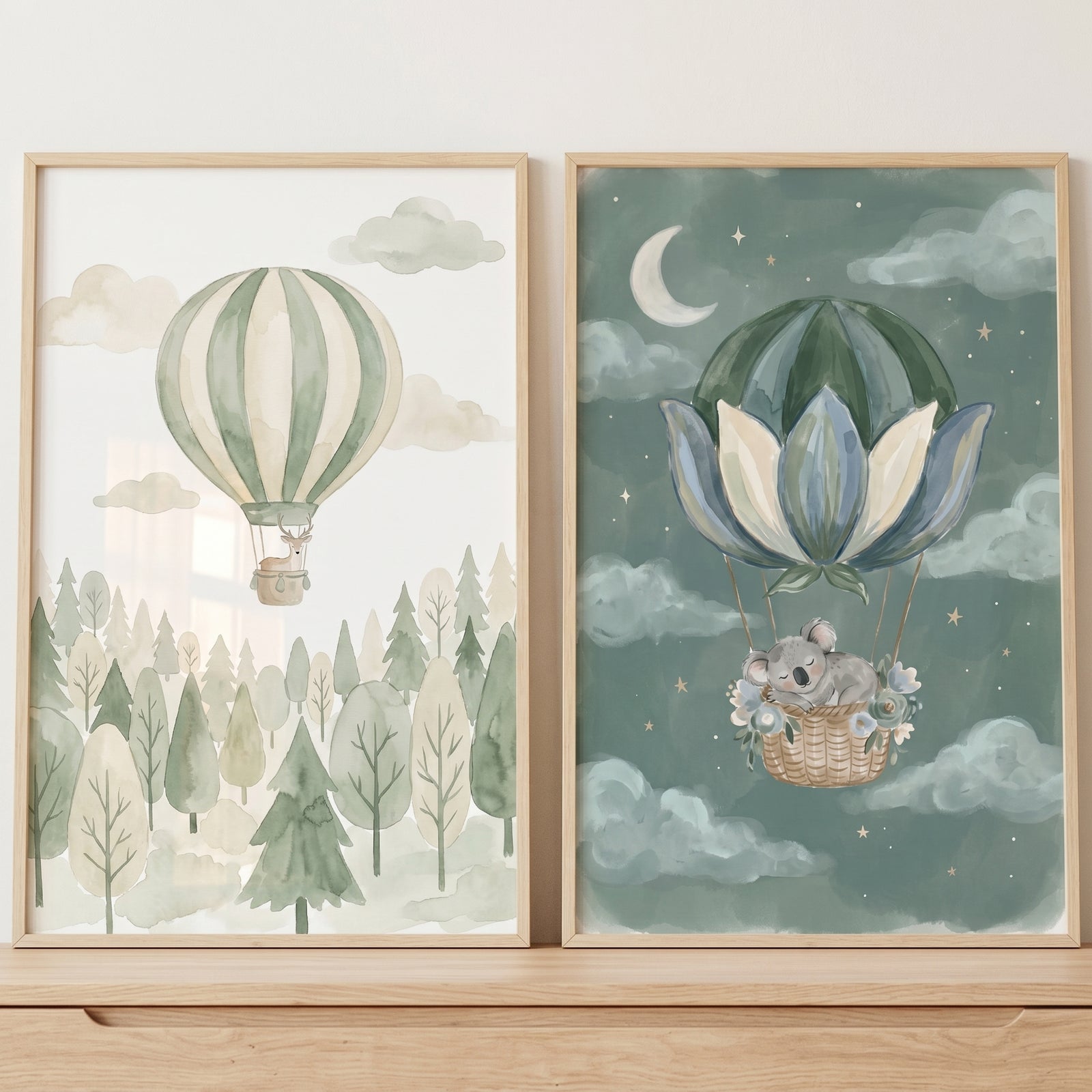 Dreamy sage balloon animal wall art set of 2 featuring a deer over a forest and a koala in a starry night sky.