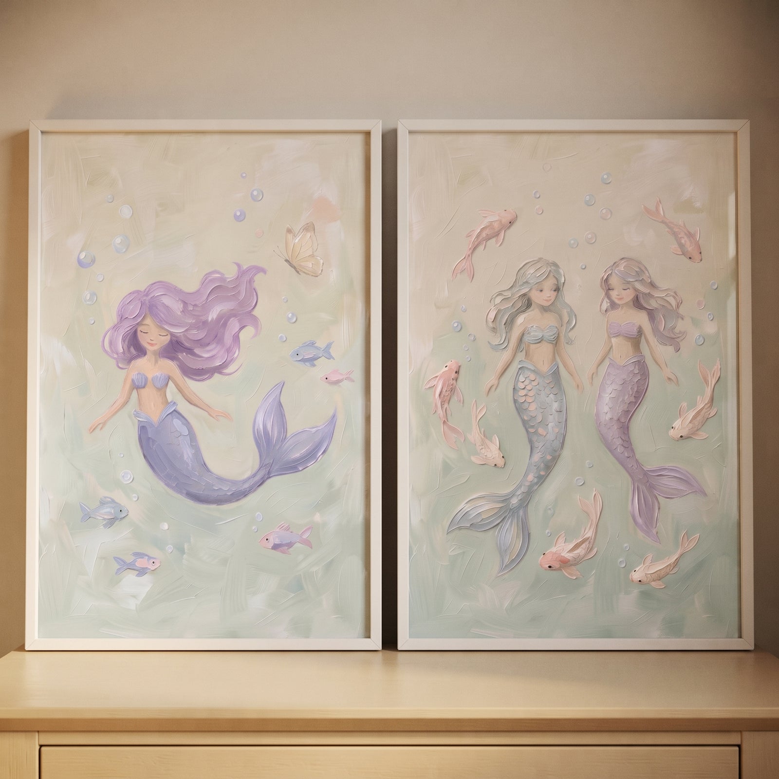 Dreamy sea mermaid wall art set of 2 featuring pastel mermaids and small fish in a soft green underwater environment.