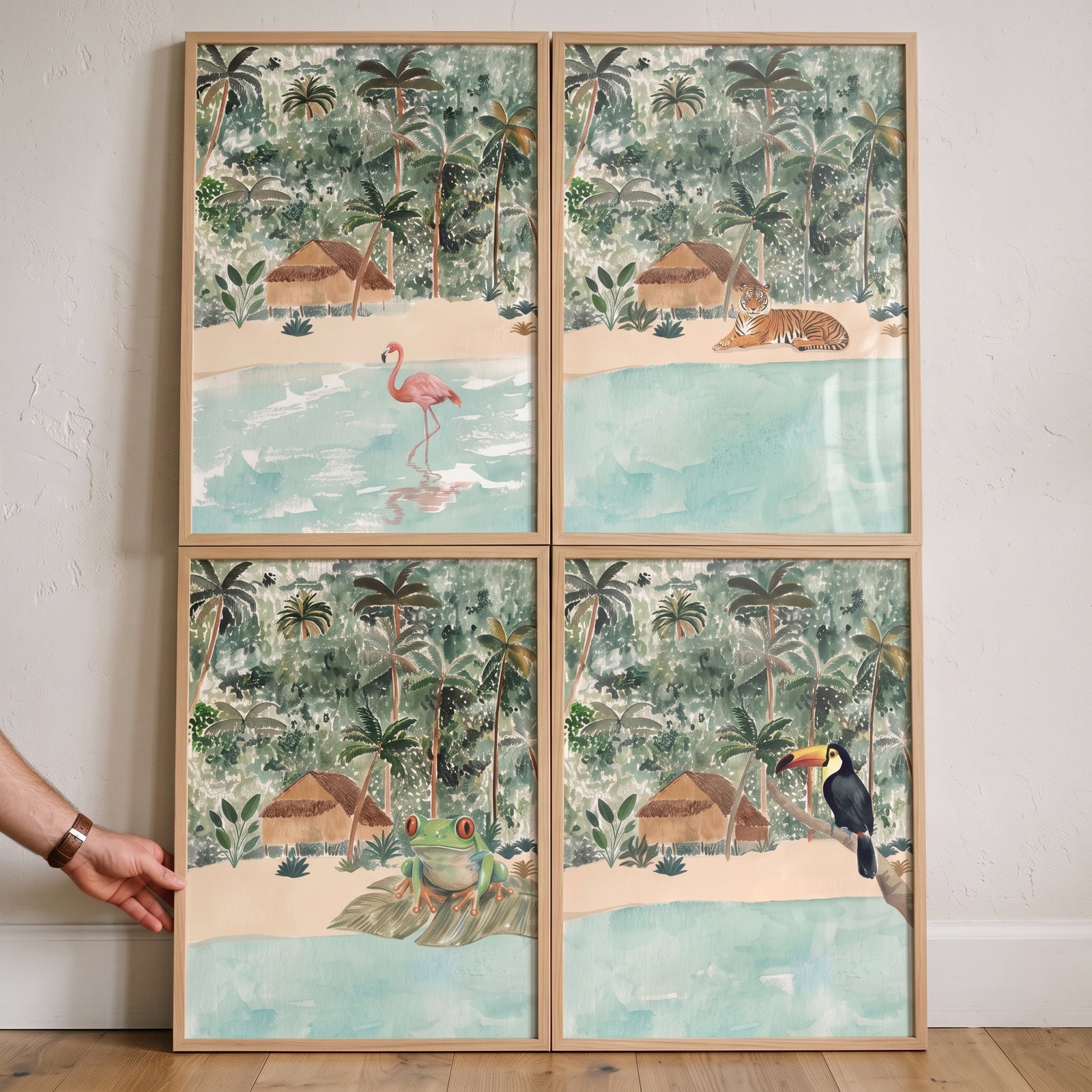 Dreamy watercolor jungle animals wall art set of 4 includes framed prints of a flamingo, tiger, frog, and toucan.