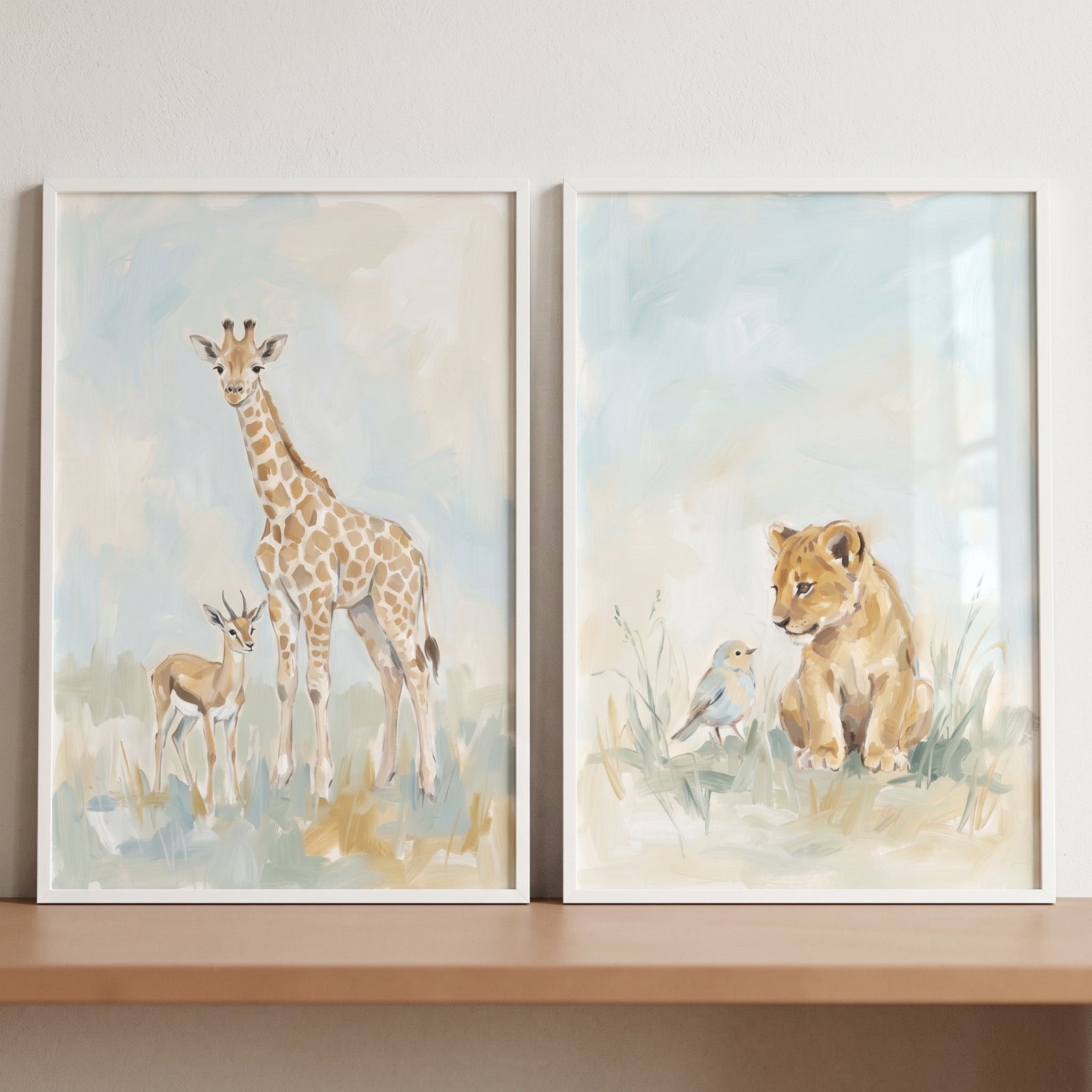 Dreamy watercolor safari animals wall art set of 2 featuring a giraffe, gazelle, lion cub, and bird in white frames.