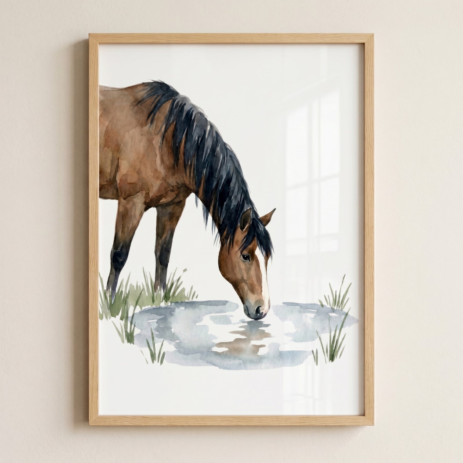 Drinking water brown horse wall art depicts a brown horse with a dark mane drinking from a pond in a light wood frame.