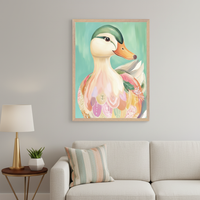 Living room with a light beige sofa and a side table. A large framed painting of a colorful, stylized duck with a green head and patterned body on a teal background hangs above the sofa. A striped pillow rests on the sofa.