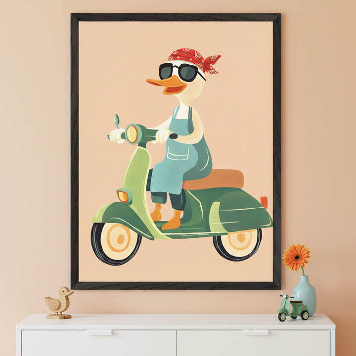 Modern room with a peach wall. A large black-framed illustration of a cartoon duck in sunglasses and a bandana riding a green scooter hangs above a white dresser. A wooden duck and toy scooter are on the dresser.