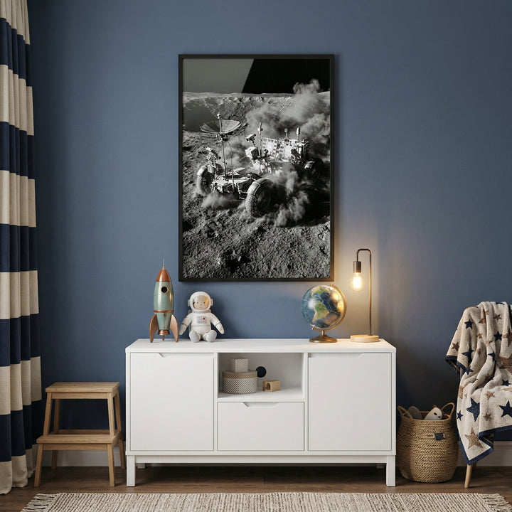 Dust kicking moon rover wall art above a white sideboard with space toys in a blue room with a striped curtain.