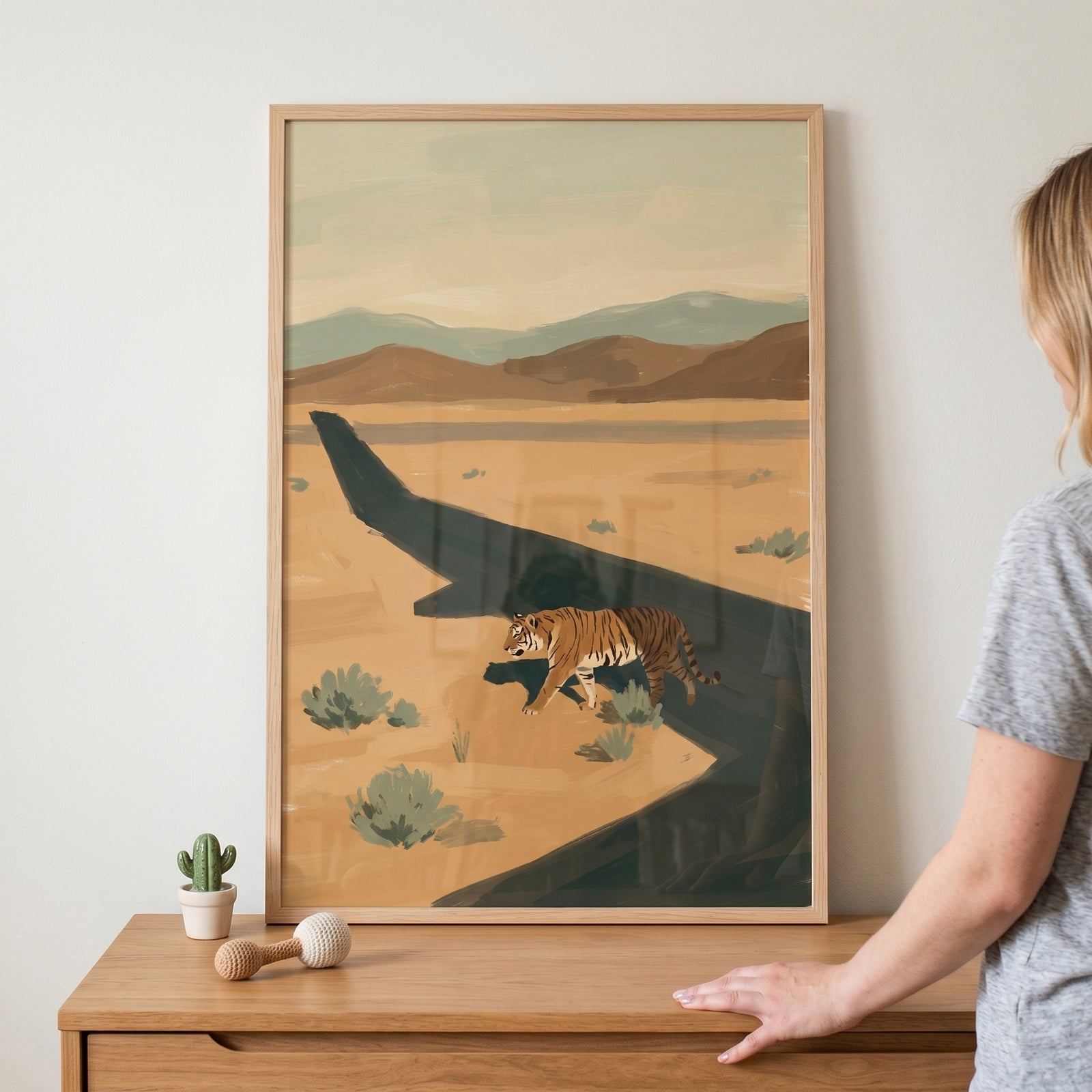 Runway biplane sitting lion wall art shows a lion on a landing strip with a small aircraft and distant mountains.