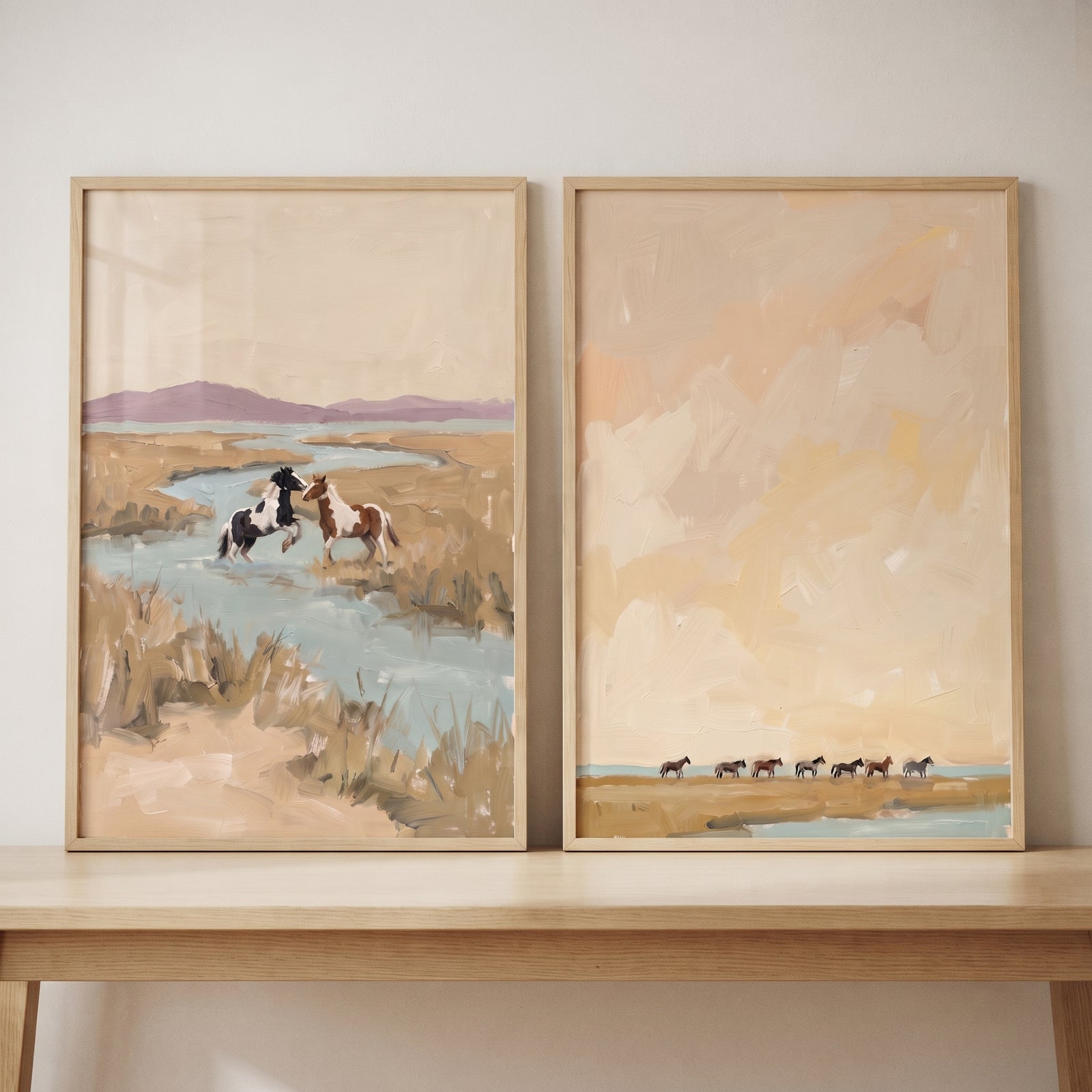 Earthy marsh wild horse wall art set of 2 features horses by a stream and a distant herd under a large soft sky.