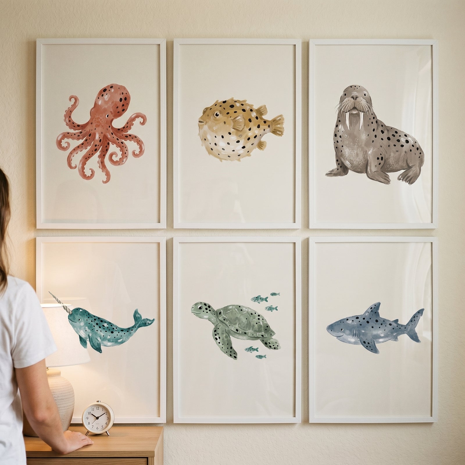 Earthy neutral ocean animal wall art set of 6 with octopus, pufferfish, walrus, narwhal, sea turtle, and shark.