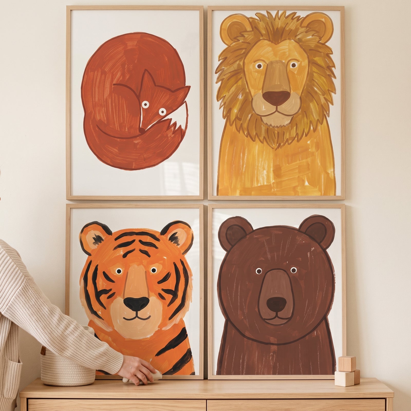 Fox, lion, tiger, and bear earthy palette safari animals wall art set of 4 displayed in light wood frames.