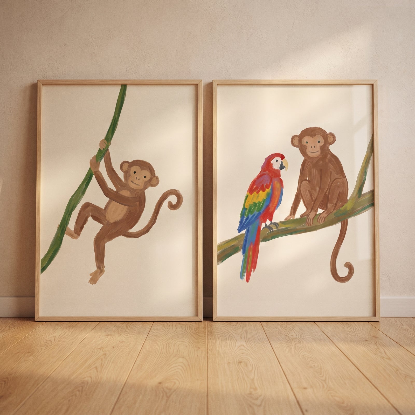 Earthy tone animals wall art set of 2 featuring illustrations of monkeys and a colorful parrot in light wood frames.