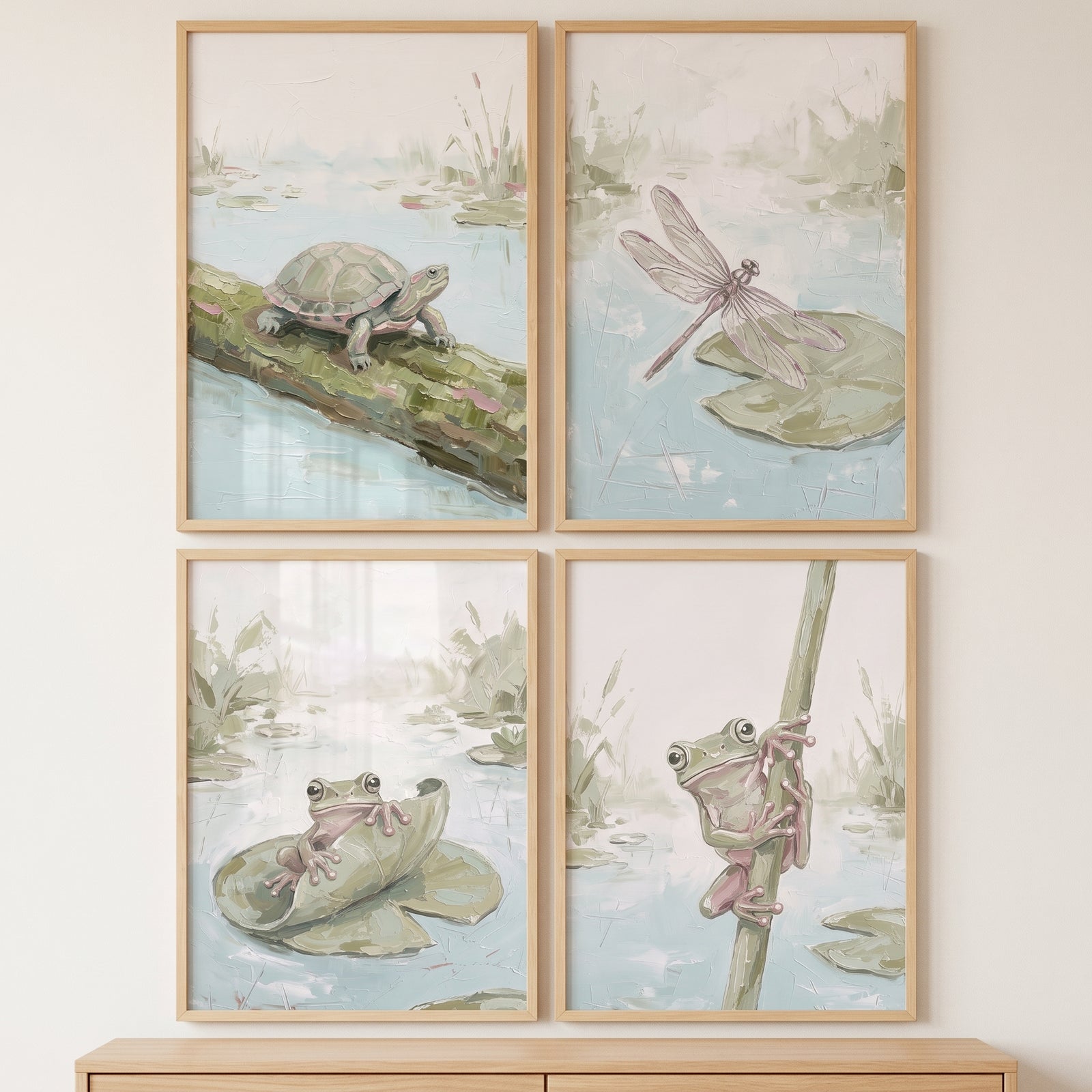 Earthy tone pond animals wall art set of 4 depicting a turtle, a dragonfly, and frogs in a soft nature setting.