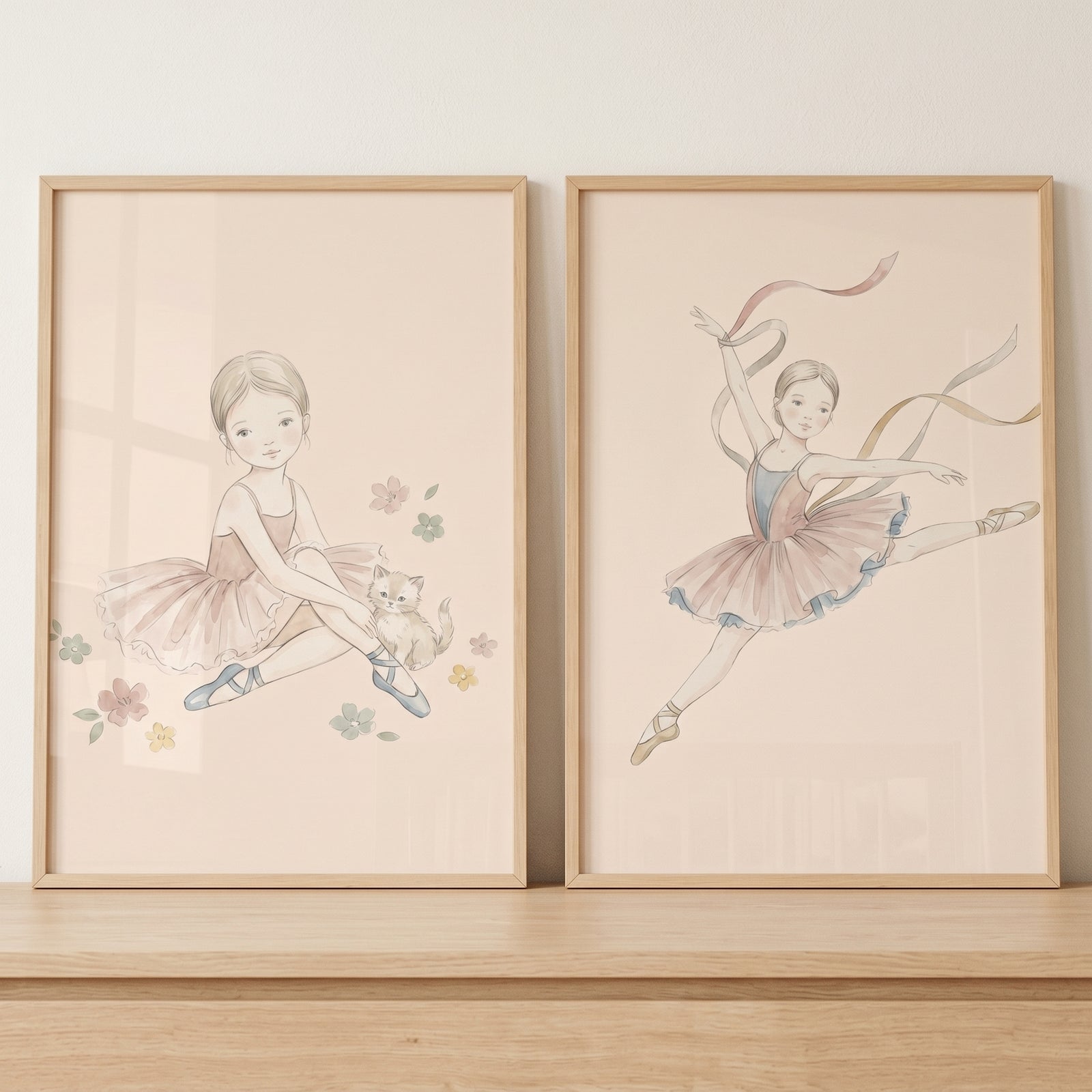 Earthy tone watercolor ballerina wall art set of 2 shows a seated dancer with a kitten and a leaping dancer with ribbons.