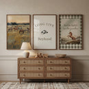 Earthy tone western horse wall art set of 3 hangs above a six-drawer dresser with a lamp and wooden toy train.