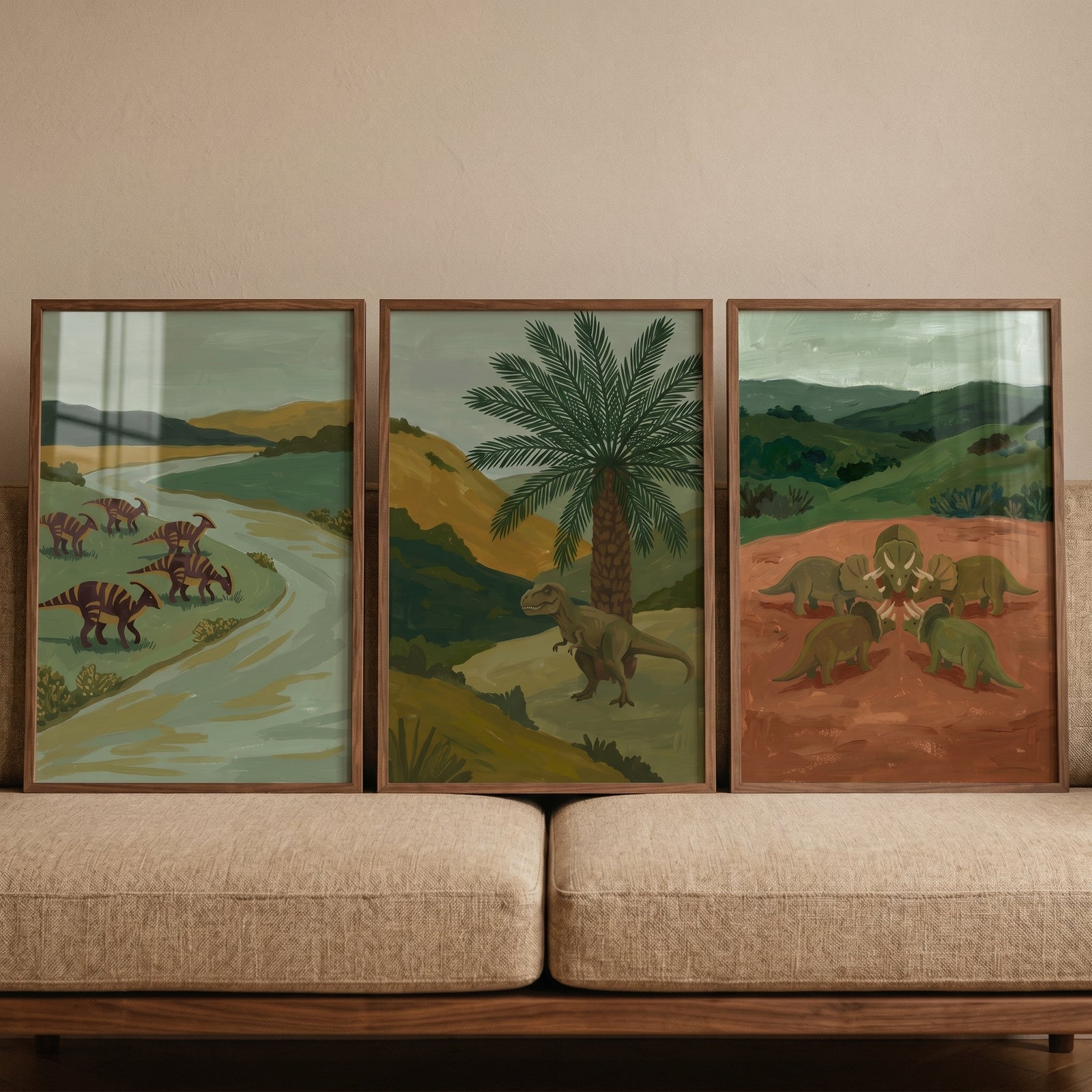 Earthy tones landscape dinosaur wall art set of 3 depicting various dinosaurs in nature scenes displayed on a sofa.