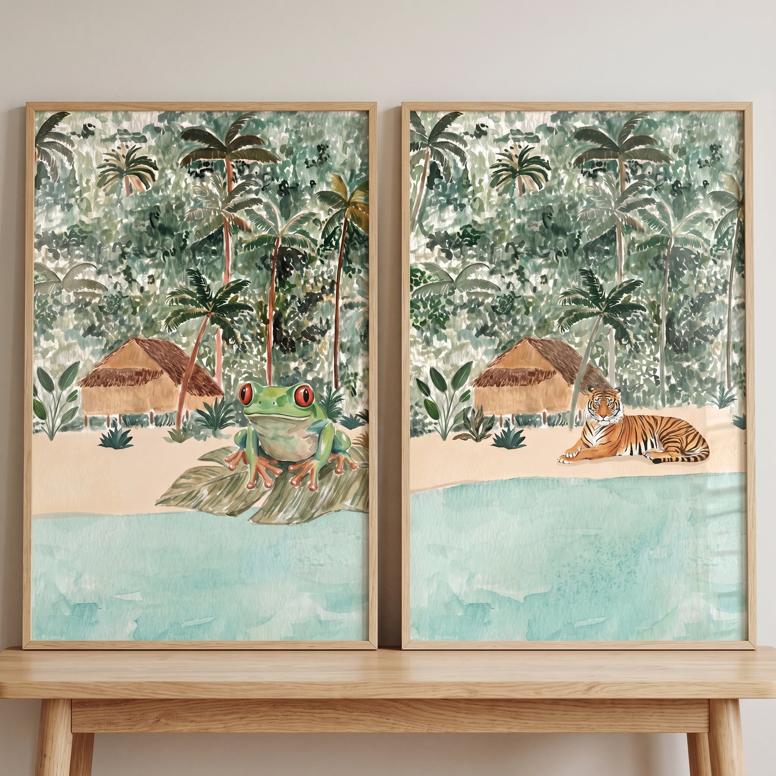 Earthy watercolor jungle animals wall art set of 2 showing a frog and tiger on tropical beaches near huts and palm trees.