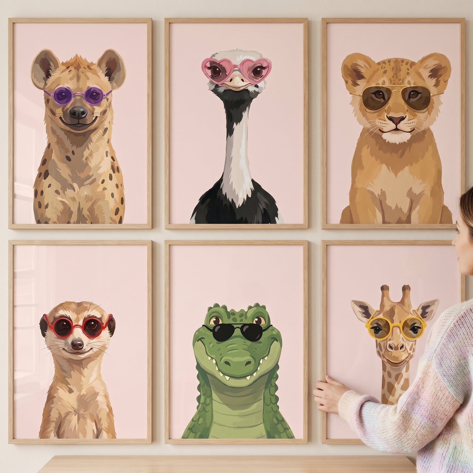 Eccentric sunglasses safari animal wall art set of 6 featuring a hyena, ostrich, lion cub, meerkat, crocodile, and giraffe.