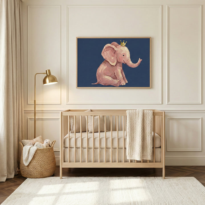A sweet, whimsical artwork of a crowned pink elephant hangs above a neutral-toned crib in a cozy, softly lit nursery. The framed painting adds a cheerful and royal touch to the serene, elegant baby room.