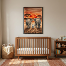 A neutral-toned nursery features a natural wood crib as the center focus. Above the crib hangs a large framed illustration of two adult elephants and a baby elephant walking across a savanna toward a vibrant red sun setting behind a few distant trees. To the left of the crib, a woven wicker basket is filled with soft plush toys and a cream-colored knit blanket. To the right, a small wooden bookshelf holds various books and wooden animal figurines. 