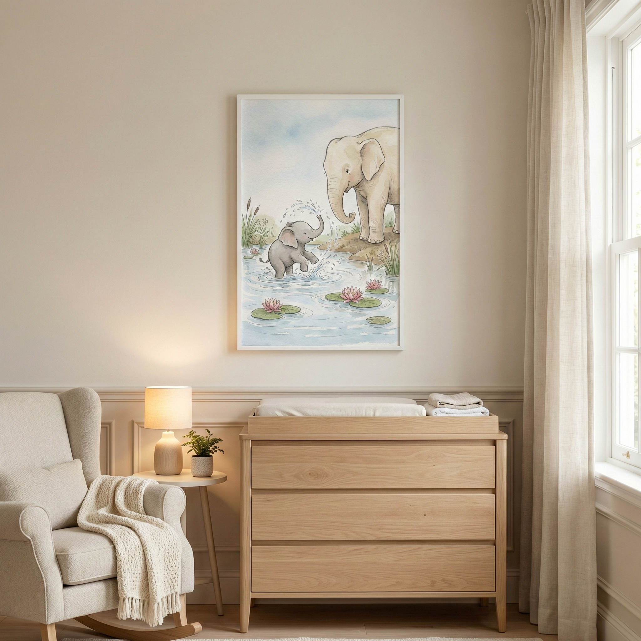 A serene nursery features a neutral palette. On the wall, a vertical artwork shows a watercolor-style illustration of an adult elephant and a calf playing in a pond with lily pads. Beneath it stands a light-toned wooden dresser with a changing pad. To the left, a plush cream armchair with a textured throw sits next to a small side table with a lamp and a plant. Soft light illuminates the room from a window with light curtains on the right.