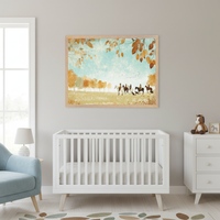 Modern nursery with a white crib and light blue armchair. A large framed painterly print of people on horseback with dogs in an autumn landscape hangs above the crib. A white dresser is on the right.