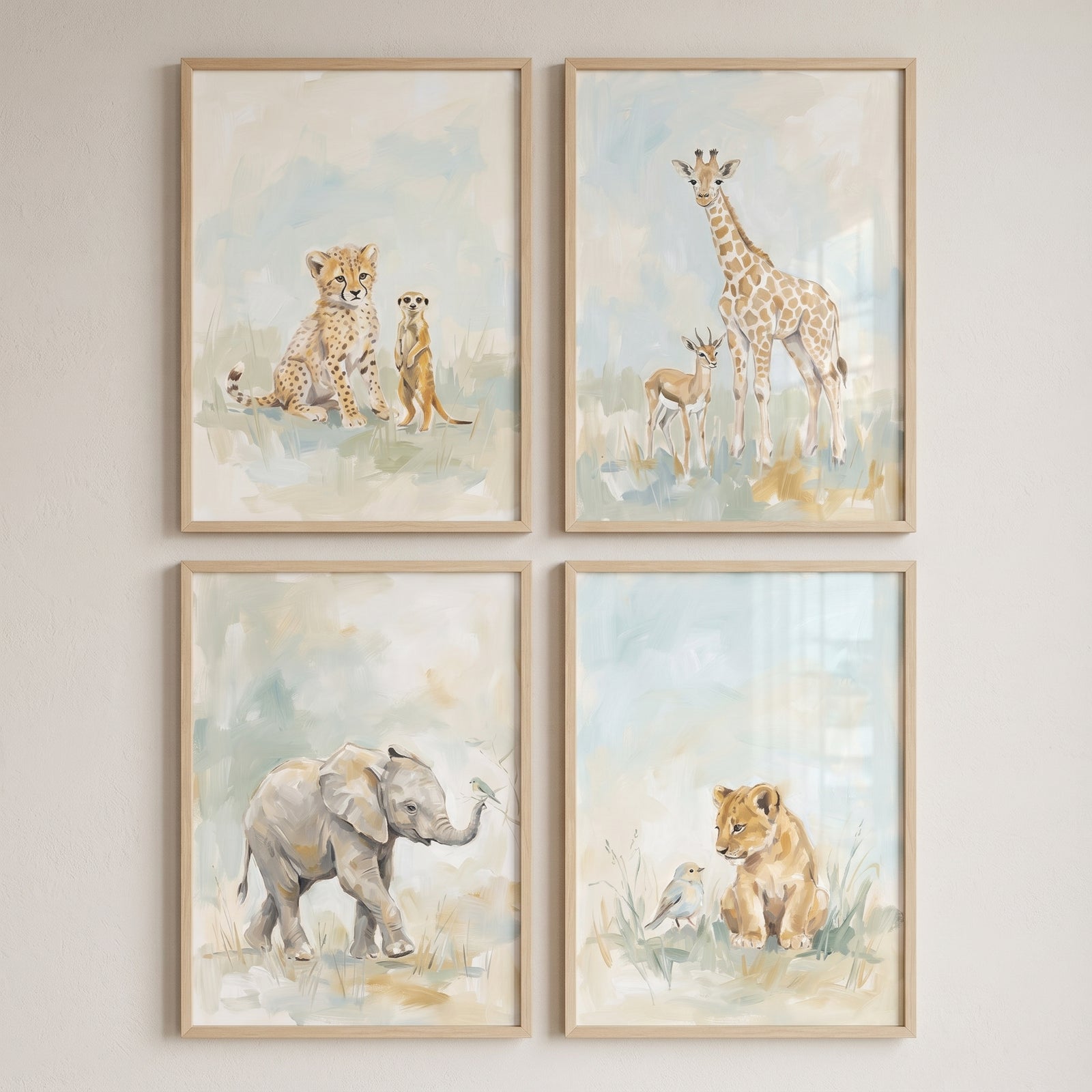 Ethereal baby safari animals wall art set of 4 featuring a cheetah, giraffe, elephant, and lion in soft watercolor tones.