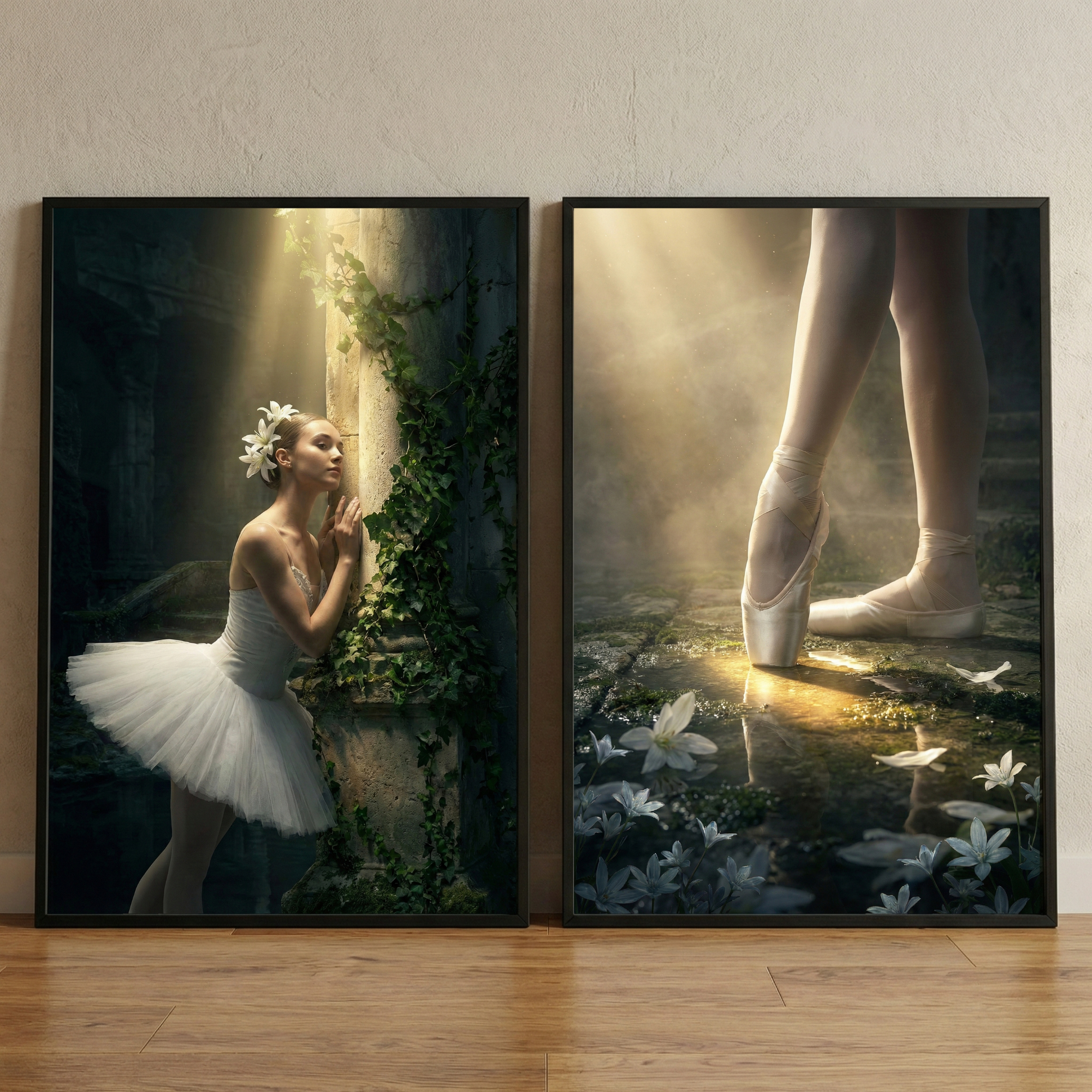Two vertical framed prints rest on a wood floor against a wall. The left print shows a woman in a white classical ballet tutu and floral headpiece, leaning against an ivy-covered stone column in a dark, atmospheric setting with beams of light. The right print is a close-up of a dancer's legs in ballet slippers; one foot is on pointe on a mossy ground with small white flowers and a glowing puddle. Both pieces feature dramatic lighting and an ethereal style.