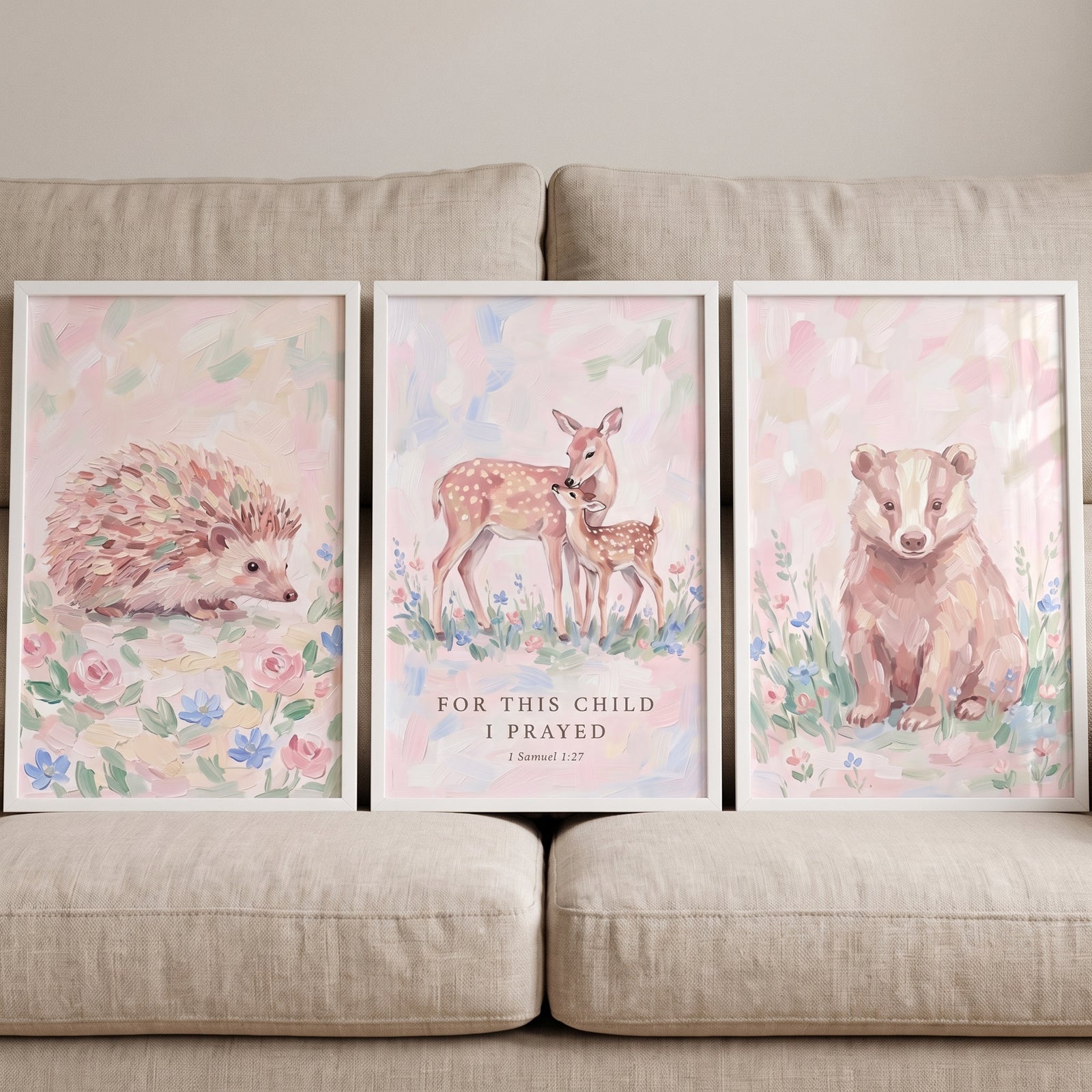 Ethereal blush forest animals wall art set of 3 with a hedgehog, deer and fawn, and badger in soft pastel tones.